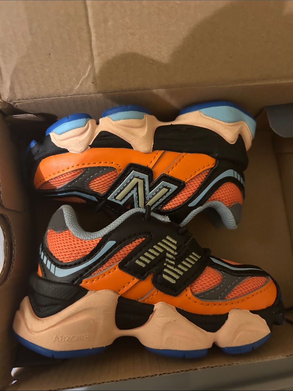 New Balance Kids Orange and Blue Athletic Sneakers